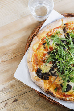 Elevated view of pizza served on the plate