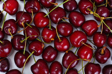 Ripe Juicy Cherries on White Background