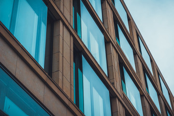 Fototapeta na wymiar Large glass windows in modern building