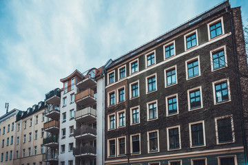 Fototapeta na wymiar Street level view of apartments with plain facade