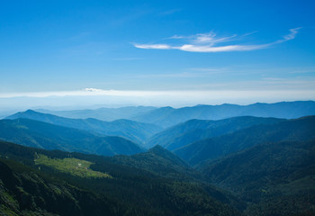 Mountain range on background of blue sky in twilight