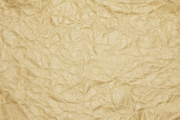 Recycled crumpled brown paper background with copy space for text or image.