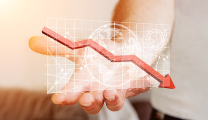 Businessman holding digital charts bars and red arrow
