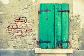 View of a dated balcony from Burano island, Venice