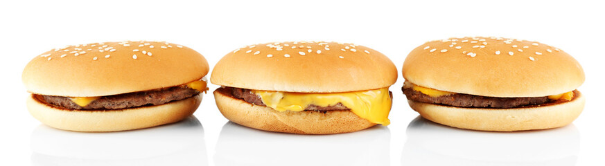 Tasty cheeseburgers, isolated on white