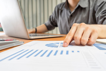businessman analyzing investment charts