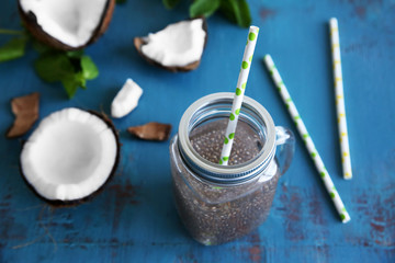 Fresh chia seed water with coconut on table