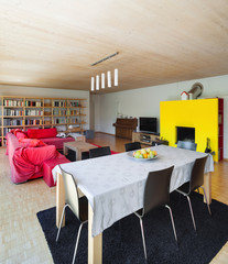 living room with dining table and fireplace