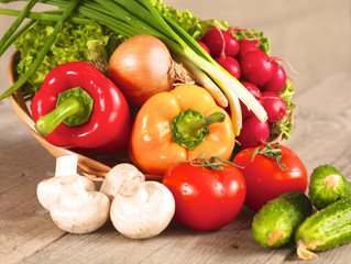 Fresh vegetables on a clean wooden table