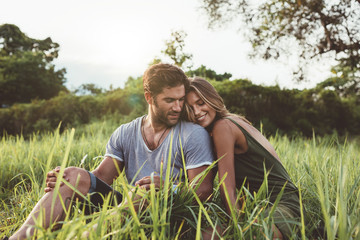 Romantic young couple in meadow