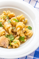 Vertical image of prepared tortolle pasta. 