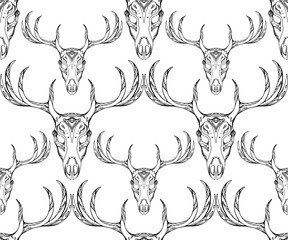 Seamless texture deer skull with horns and boho pattern. Vector background for your creativity