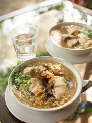 boil rice with fresh fish and vegetable