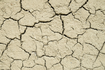 Old wall plastered with mud closeup