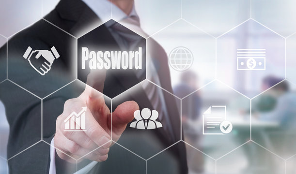 A businessman selecting a Password Concept button on a hexagonal screen