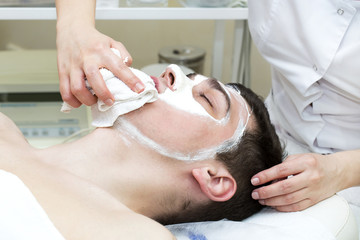 man in the mask cosmetic procedure in spa salon