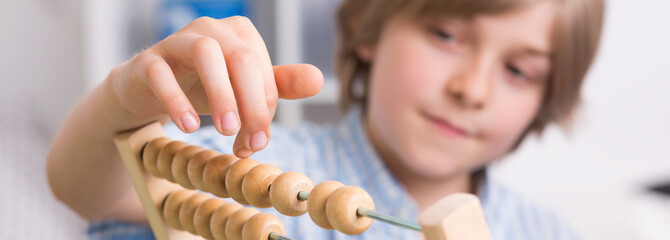 Boy with abacus