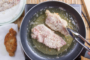 Chef deep fried pork in pan