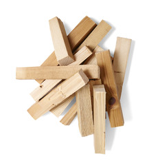 A pile of wood fire kindling isolated on a white background
