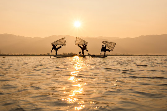 Fisherman Silhouette at Sunset, Inle lake, Myanmar , Burma