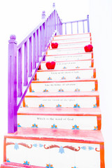 colorfull stairs with wooden handrail isolate on white backgroun