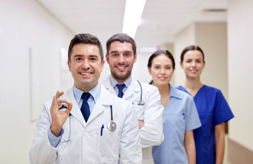 Fototapeta premium group of happy medics or doctors at hospital