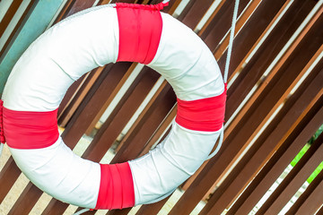 close up pool safety life ring on the lath wall