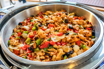 stir fried chicken with cashew nuts, onion, sweet pepper, chili