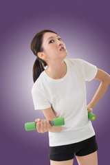 Naklejka premium woman holding dumbbell