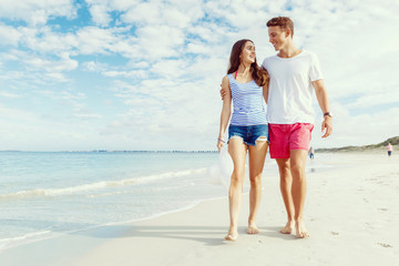 Romantic young couple on the beach