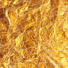 Gold Paper wrinkled background texture.