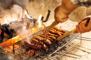 Grilled sausages cooked on the grill