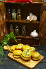 Bread toasts with basil, chives and garlic