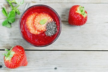 Fresh strawberries smoothies with chia seeds . Selective focus
