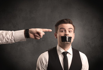 Business hand pointing at employee