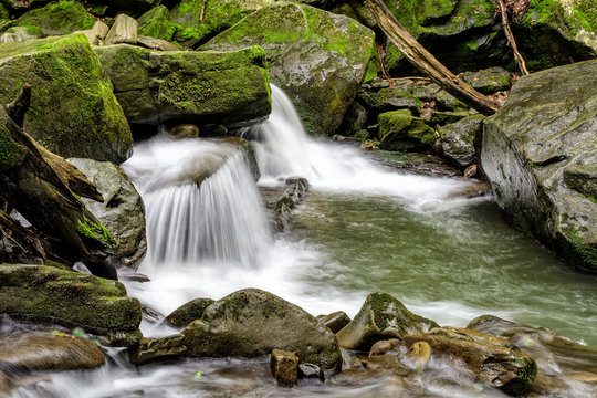 small cascade on the river among bouders