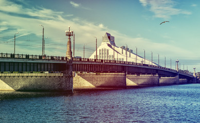 Stone bridge and building of National public library in Riga, Latvia