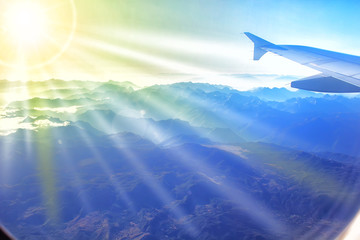 Obraz premium View of mountains from a plane window