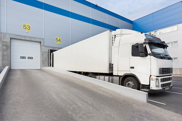 Truck while loading in a big distribution warehouse