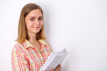 Happy young student girl holding books, study, education, knowledge, goal concept