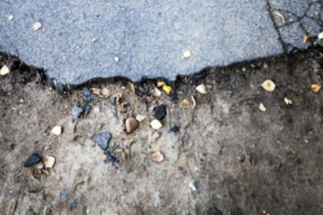 the broken asphalt