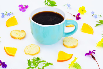 Coffee in a Blue Retro Cup with Flowers