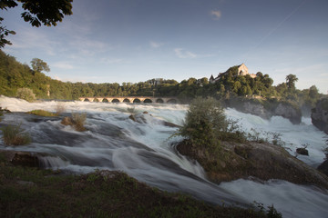 Rheinfall and the castle Laufen. The largest Europian waterfall during a summer sunset. Swizerland.