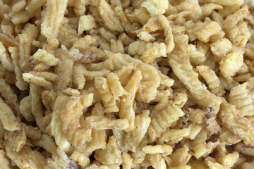 This is a closeup photograph of crispy fried onions