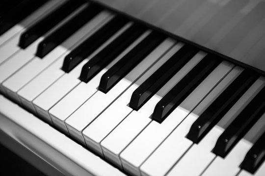 Black and white piano keys. Musical keyboard instrument. Perfect equipment to extract the sounds. Classical music.