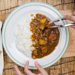 Chef decorated Japanese pork curry with steam rice