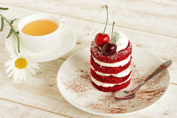 red cake with cherry