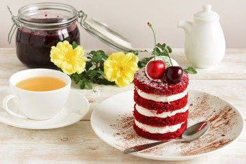 red cake with cherry