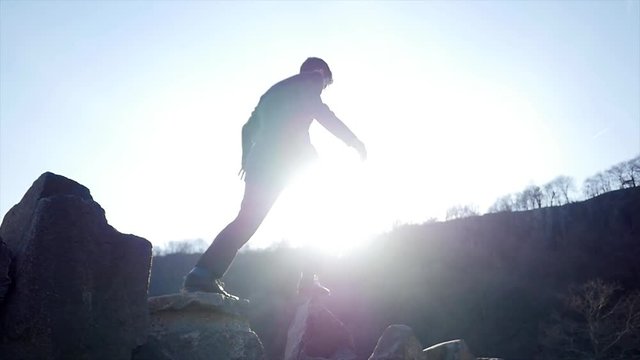 man overcoming obstacles and succeed in business career. recreational activity