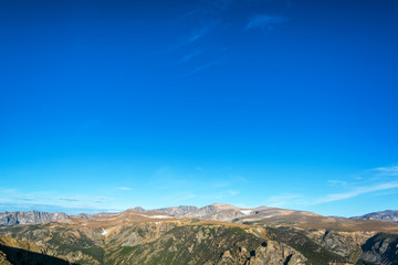 View of the Beartooth Mountains in Montana with sky in the top two thirds of the picture